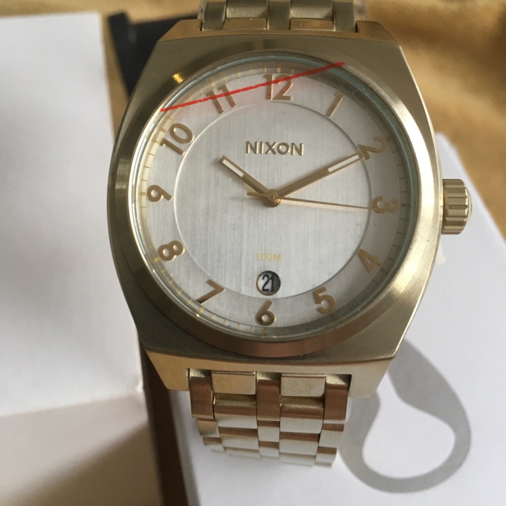 Nixon gold unisex watch . New never used
